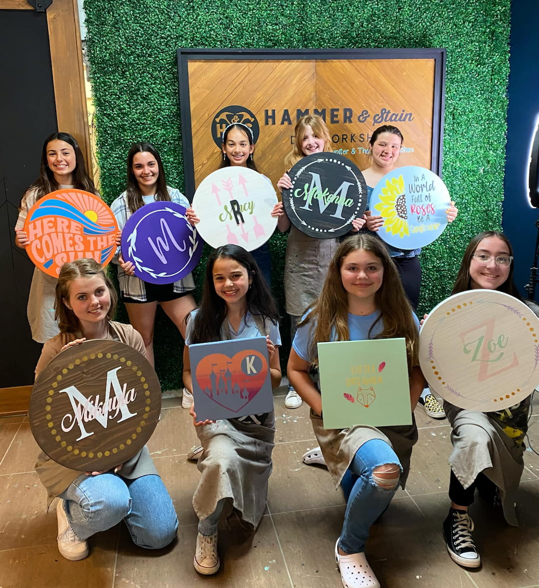 a group of people holding signs