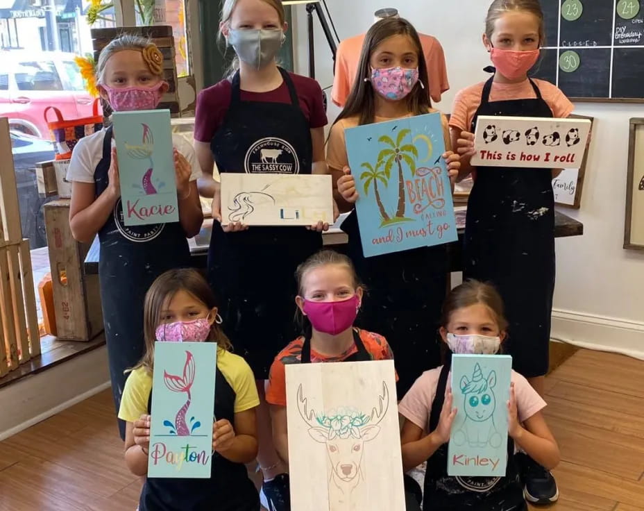 a group of people holding signs