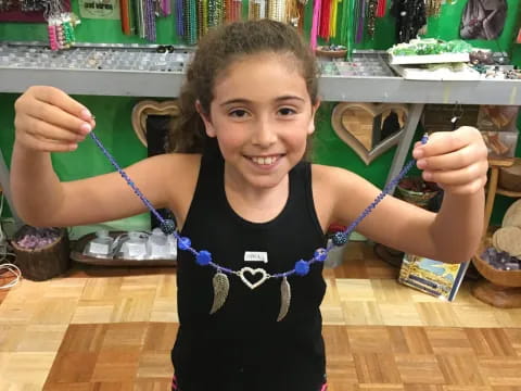 a girl holding a toy sword