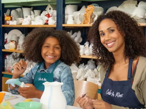 a couple of women smiling