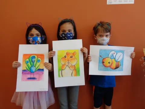 a group of children holding books