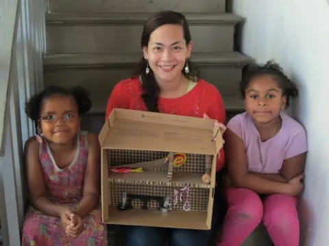 a woman and two children