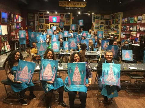 a group of people holding signs