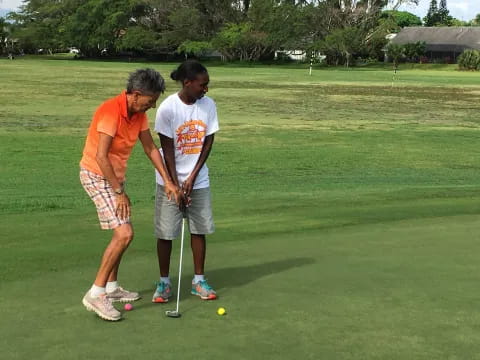 a couple of men playing golf