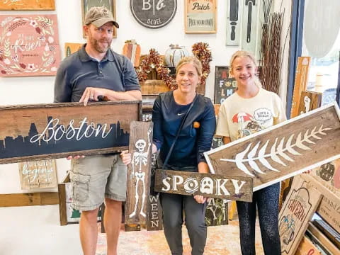 a group of people holding signs