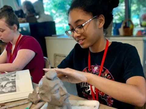 a person holding a bag of food