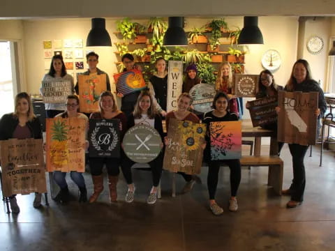 a group of people holding signs