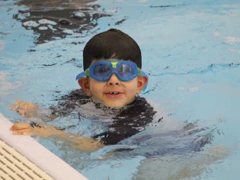 a boy in a pool