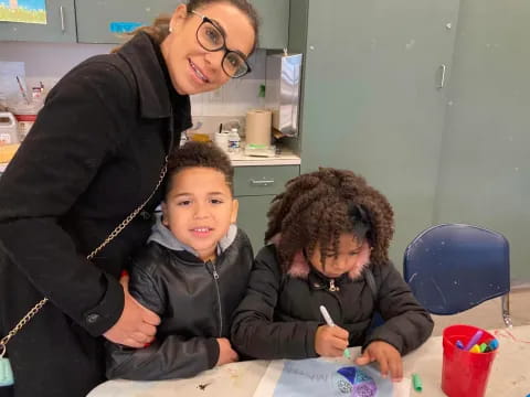 a person and two boys