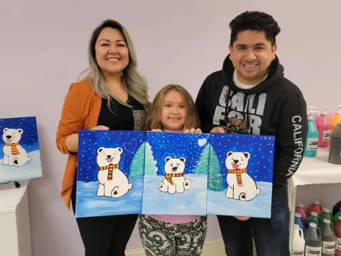 a man and woman with a child