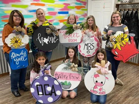 a group of people holding signs