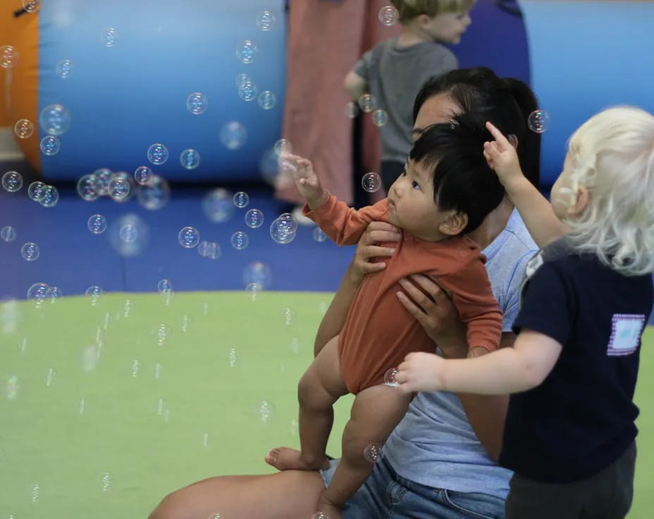 a person holding a baby