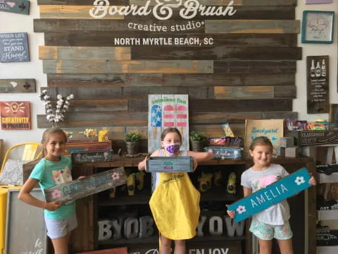 a group of children holding books