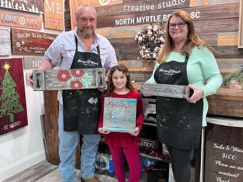 a group of people holding signs