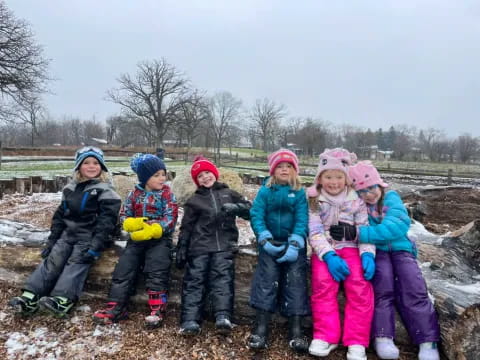 a group of children posing for a photo