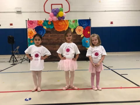 a group of girls in a gym