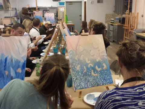 a group of people sitting at tables