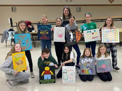 a group of people holding signs