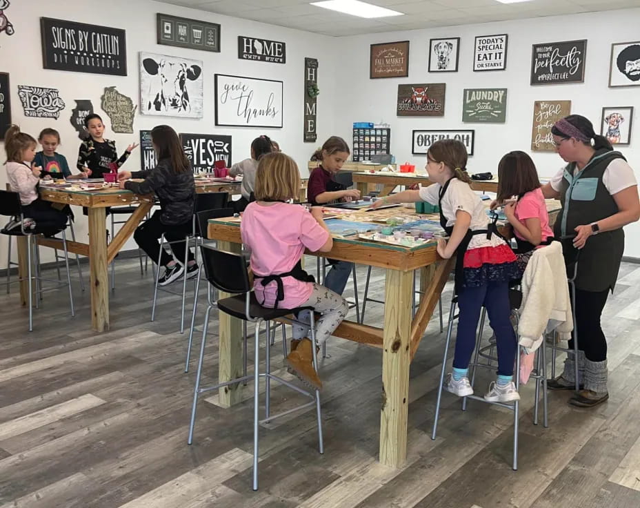 a group of people sitting at tables
