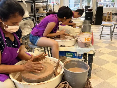 a group of children cooking