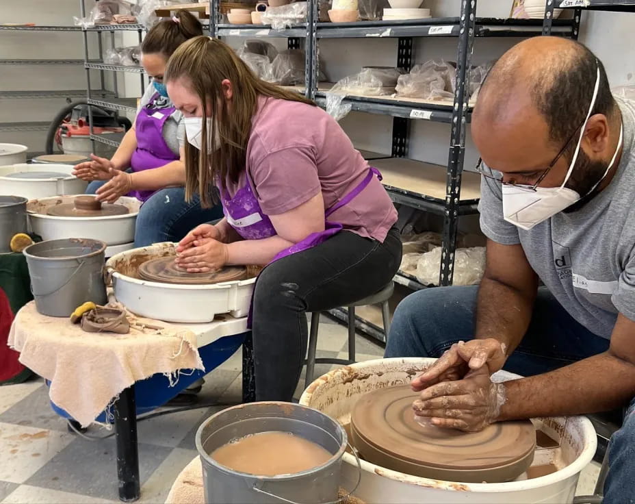 a man and a woman preparing food