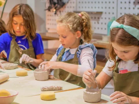 a group of children painting