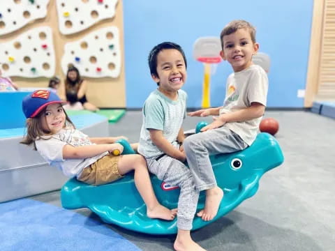 a group of kids on a toy