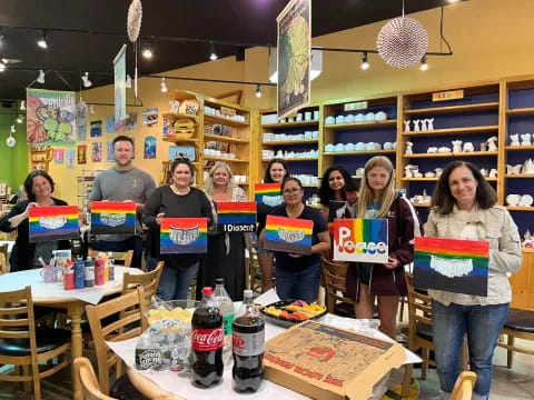 a group of people holding signs