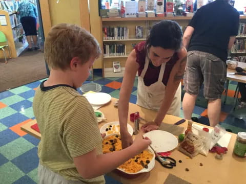 a group of people eating food