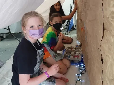 a group of people in a tent