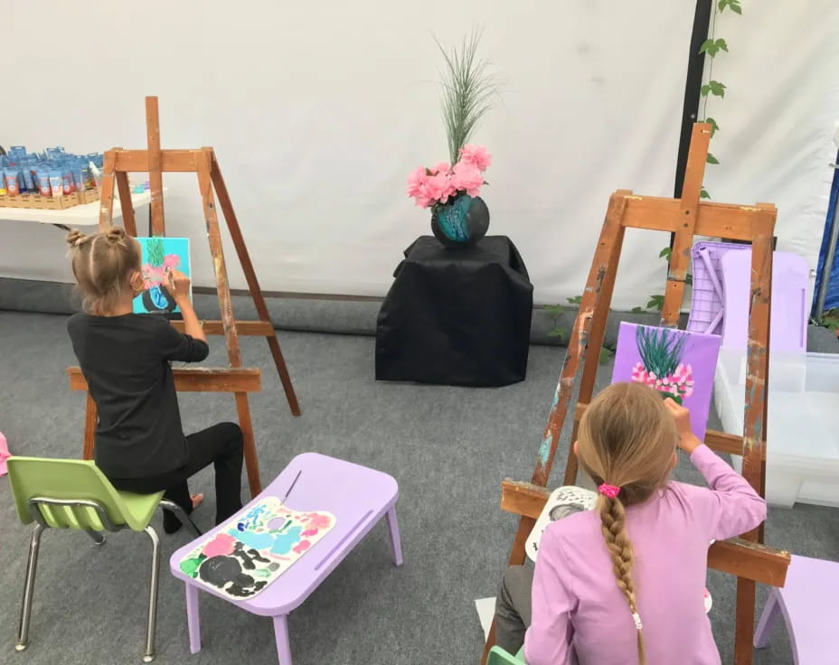 a couple of girls painting