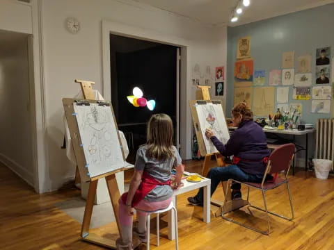 a person painting in a room