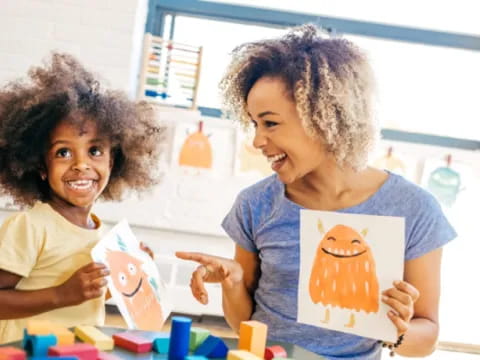 a few young girls painting