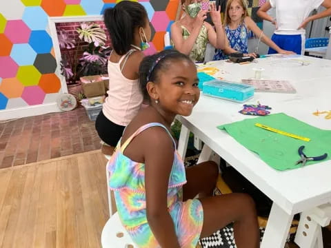 a group of children painting