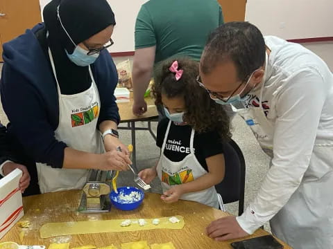 a group of people painting