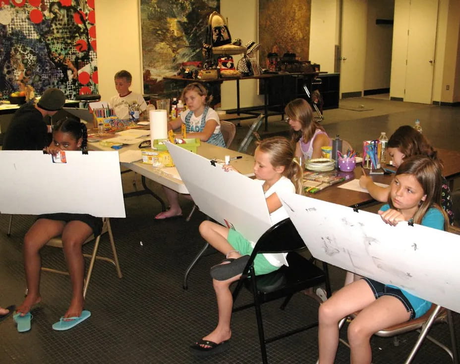 a group of people sitting at tables
