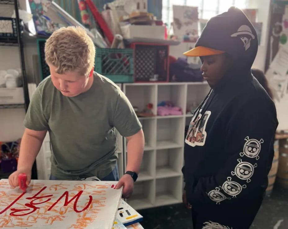 a couple of boys in a store