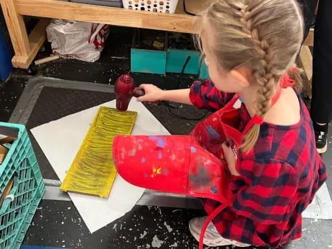 a young girl painting