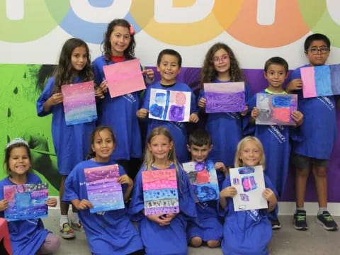 a group of people holding signs