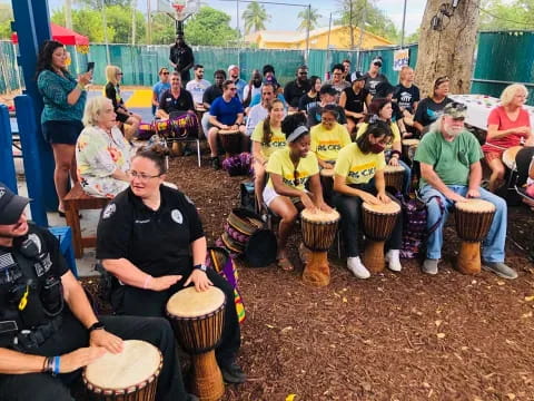 a group of people sitting outside