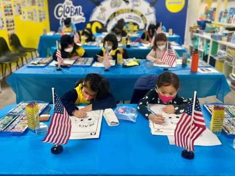 children sitting at a table