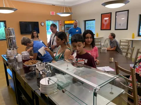 a group of people in a restaurant