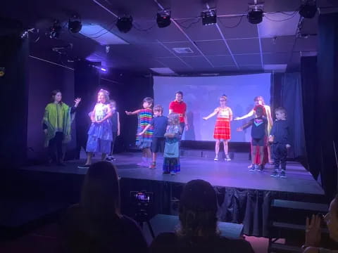 a group of people on a stage