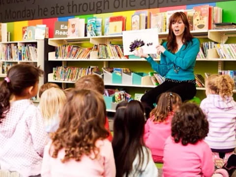 a teacher teaching her students