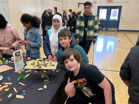 a group of people around a table
