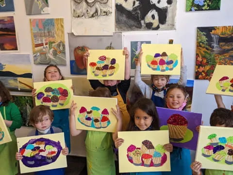 a group of children holding books