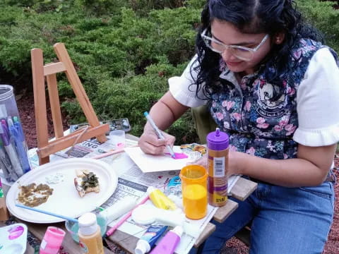 a woman sitting at a table eating