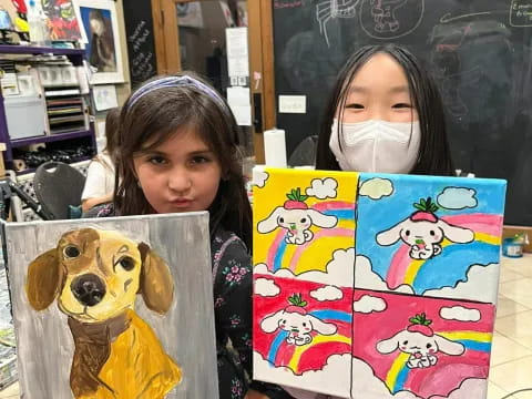 a girl holding a poster