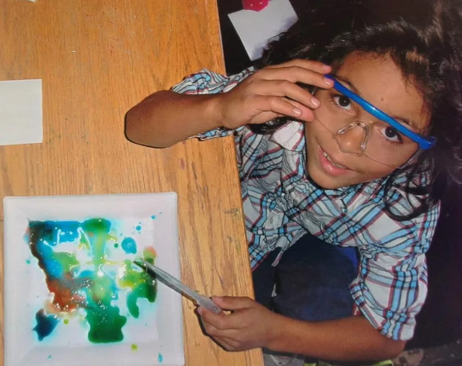 a young boy painting