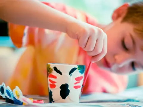 a child with a football ball
